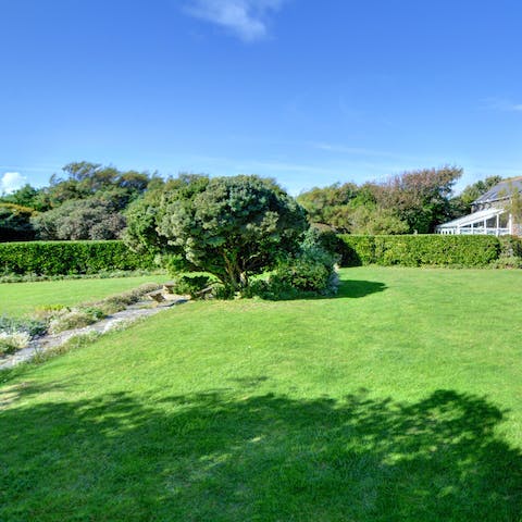 Explore the house's acre of grounds