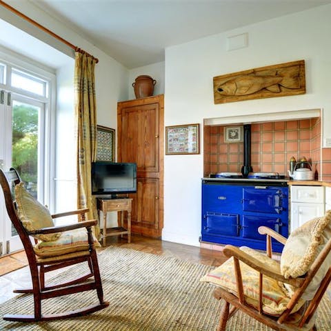 Warm up in a cosy rocker by the AGA