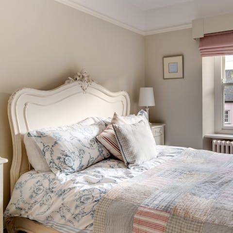 Drift off to sleep in the antique beds after a busy day exploring