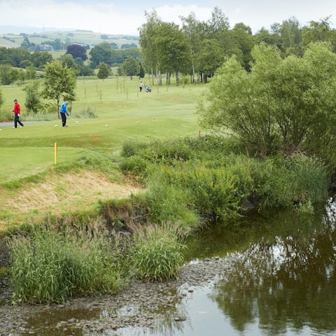 Play a round of golf at Carus Green Golf Club, just footsteps away