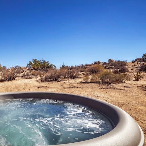 Relax in the jets of the hot tub while admiring the view