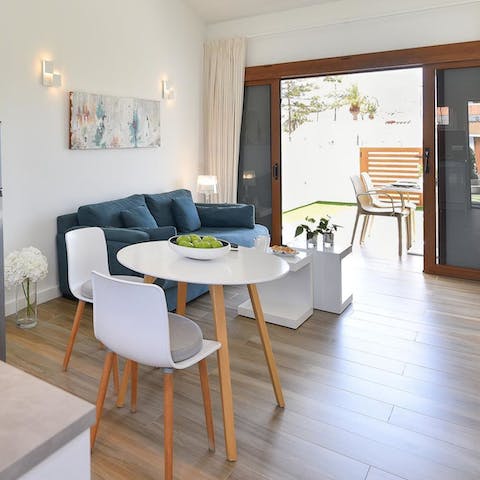 Step right out to the sunny terrace from the sliding doors of your lounge