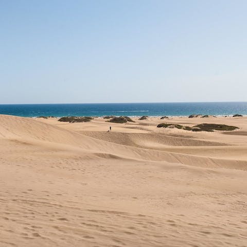 Admire the desert landscape of the Maspalomas Dunes, three minutes away by car