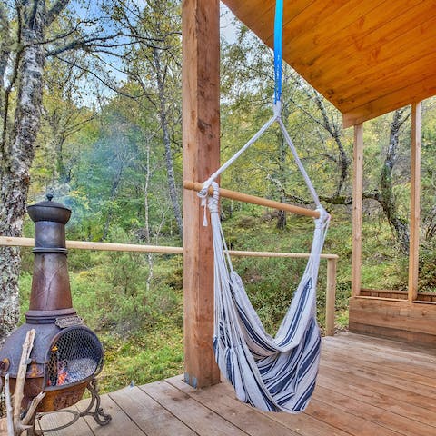 Savour your peaceful surroundings while relaxing in the hammock