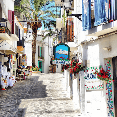 Explore the cobbled streets of Ibiza Town, a short drive from home