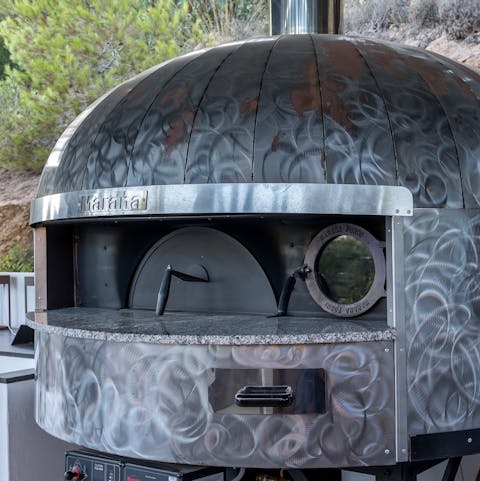 Show off your cooking skills on the outdoor pizza oven