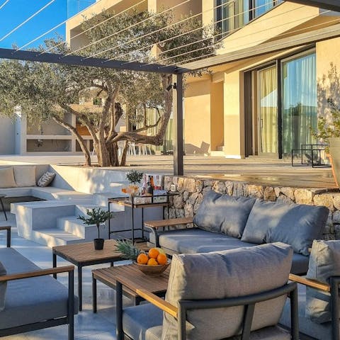 Settle in to the plush outdoor lounge and soak up the sun