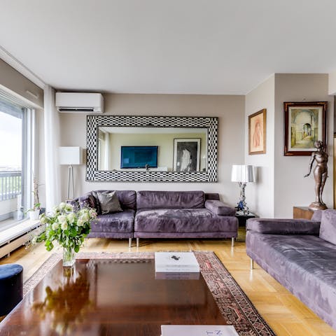 Spend your evenings relaxing in the living room as the sounds of the city rumble on quietly below