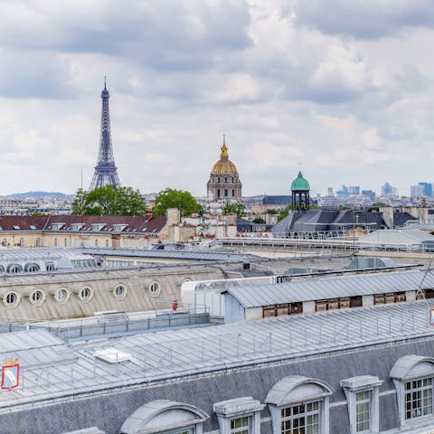 Gaze out at some of Paris' most historic buildings directly from your balcony