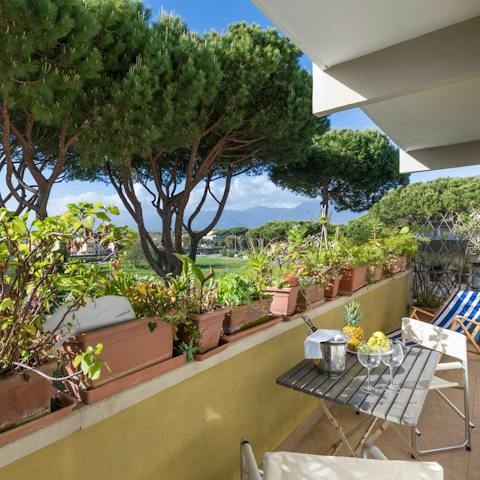 Sip a Prosecco on the private balcony with mountain views