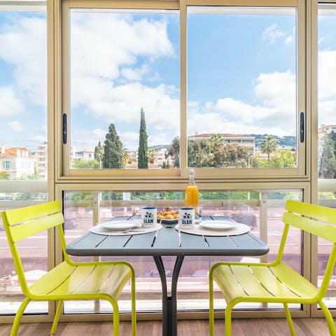 Enjoy your morning café au lait on the sunny loggia