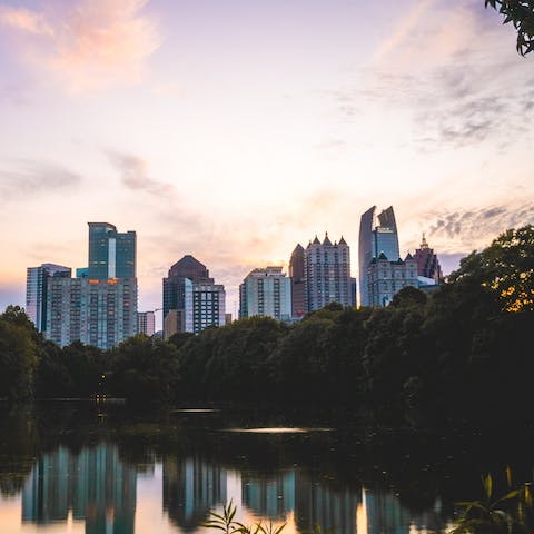Take in soaring skyline views from the 185-acre Piedmont Park, a five-minute drive away