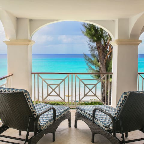 Pour yourself a drink and sit back on the balcony to admire the seaside scenery