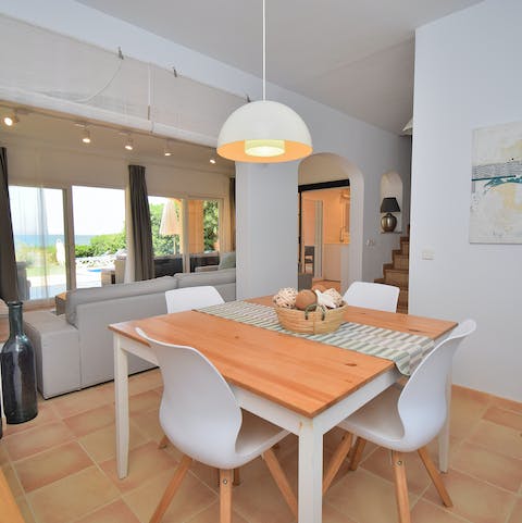 Discuss tomorrow's plans while trying a traditional dinner of frito mallorquín