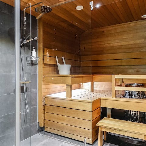 Relax and unwind in the private sauna
