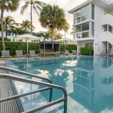 Lounge out by the building's resort-style pool and splash around