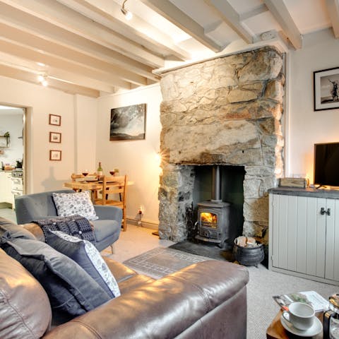 Curl up in front of the log burner fire after a day of exploring North Wales 