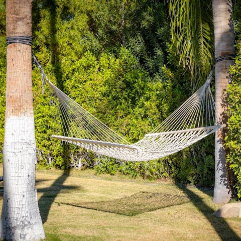 Read some magazines or take a nap in the hammock