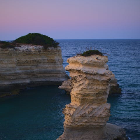 Saunter down to the cliffs and watch a sunset from the southernmost point of Puglia