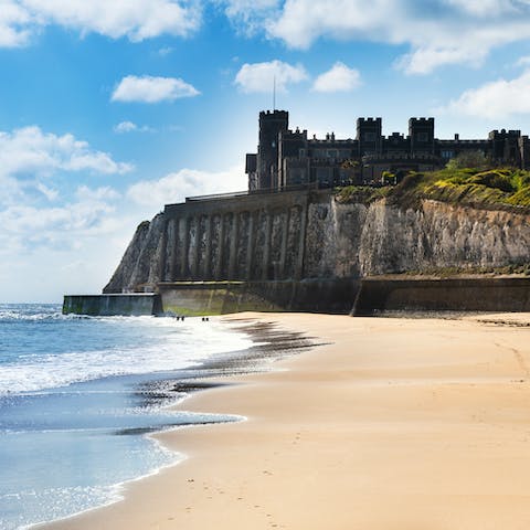 Soak up the history at Kingsgate Castle, a twenty-five-minute walk away,  before relaxing on the beach