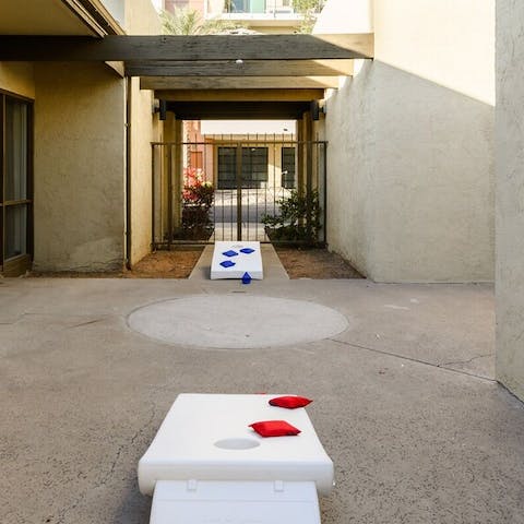 See which household is best at cornhole