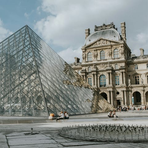 Start your sightseeing at the Louvre, a short walk away
