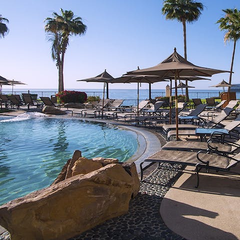 Relax by the pool, cool drink in hand and not a care in the world