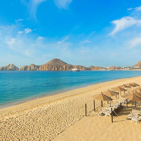 Head down to the stunning sandy beach, just a few steps away from your door