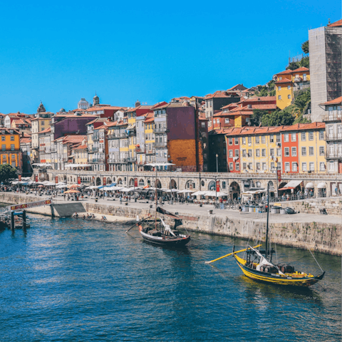 Find a sunny spot for drinks along the Douro River, within walking distance
