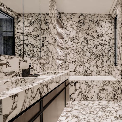 Get ready for an evening out in Paris in the stylish bathroom