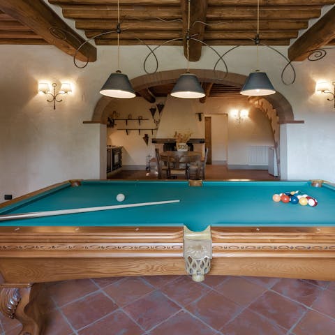 Head to the billiards room for a friendly tournament