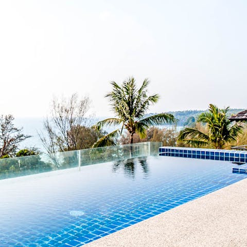 Take a refreshing dip in the infinity swimming pool 