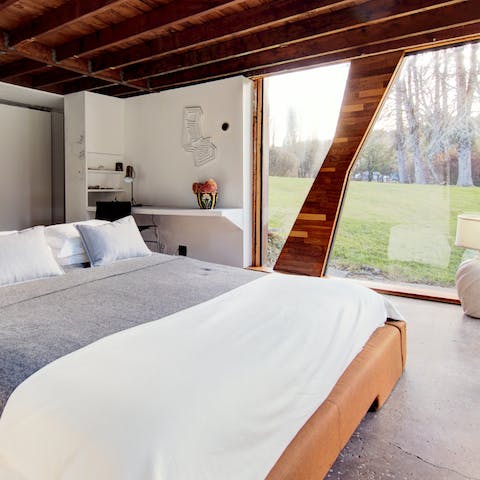 Wake up to views of the birch tree-studded grounds