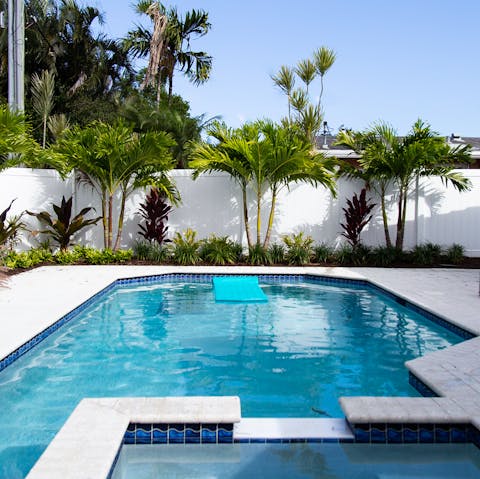 Settle in by the heated pool and spa