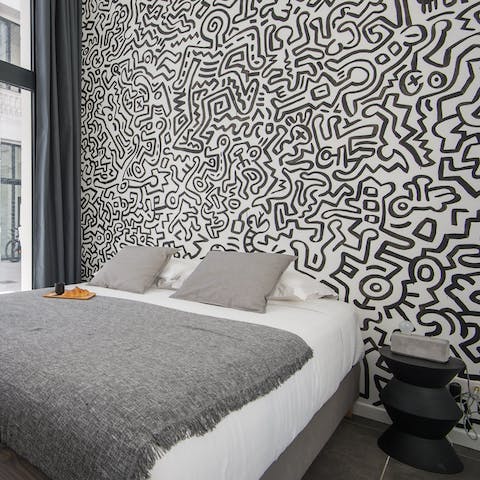 Wake up in a bedroom with Keith Haring-inspired decor