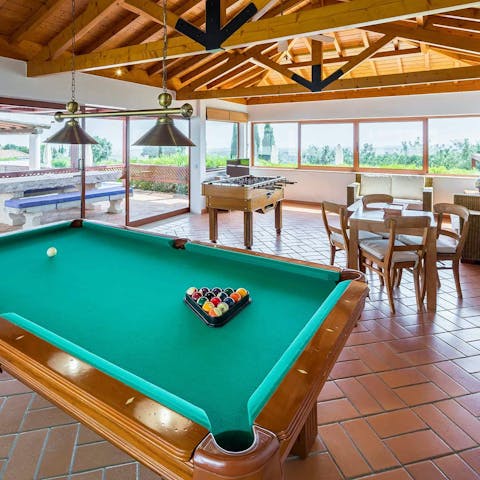 Embrace friendly competition with games in the pool house