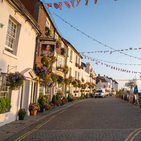 Explore Deal, a ten-minute drive away, and its independent shops, cafes, pubs, and more