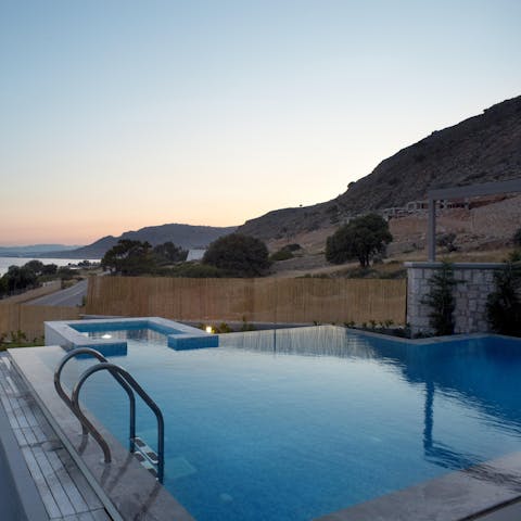 Take a twilight dip with the Mediterranean Sea as your backdrop 