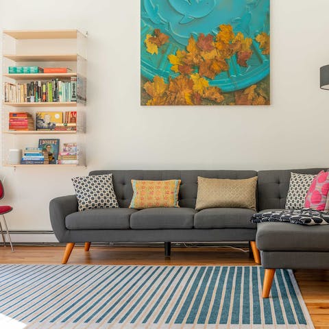 Admire the home's colourful artwork and minimalist design 