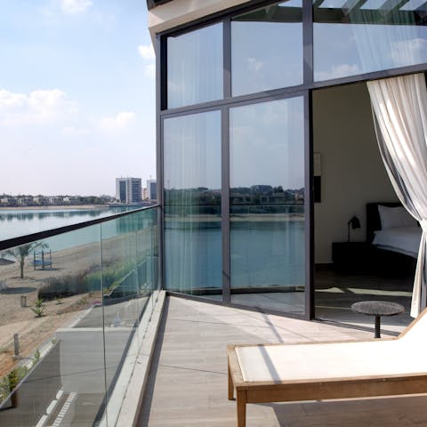 Roll right out of bed and onto your private balcony where you can catch some sun on the lounger