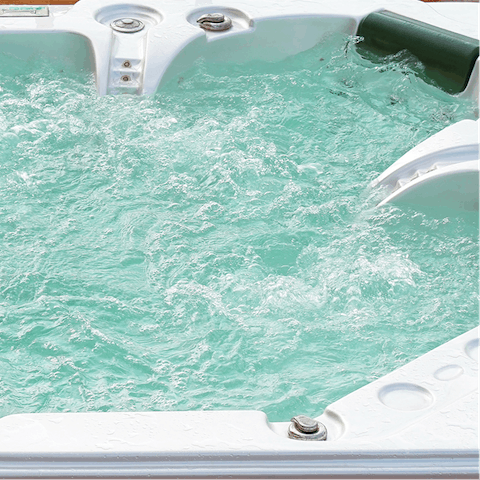 Warm up in the hot tub on a chilly evening