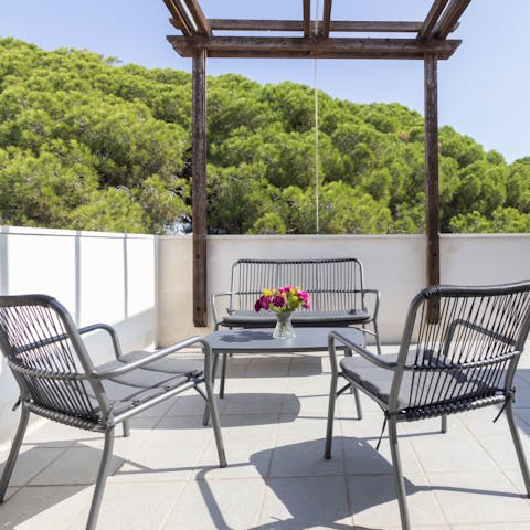Soak up the Spanish rays on the home's rooftop