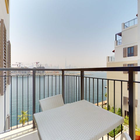 Admire water views from the private balcony