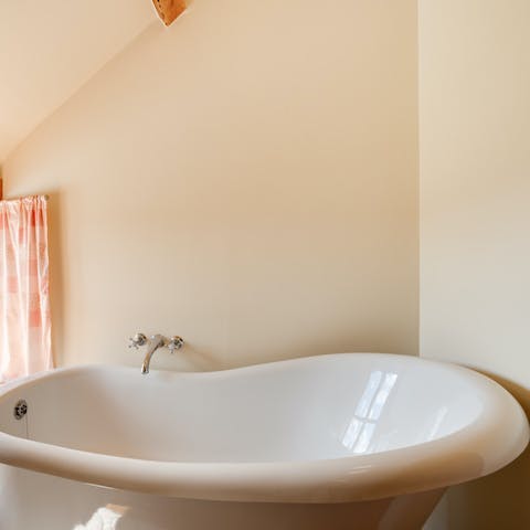 Enjoy some downtime and take a soak in the slipper bathtub