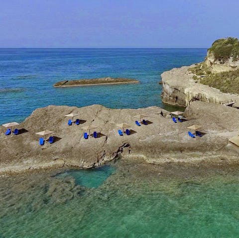 Swim in Kefalonia's azure sea, directly beneath the home