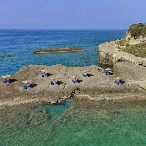 Swim in Kefalonia's azure sea, directly beneath the home