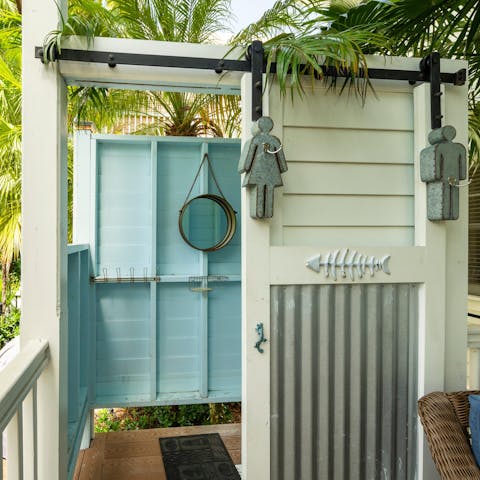 Rinse off in the outdoor shower after a dip in the pool to start your day