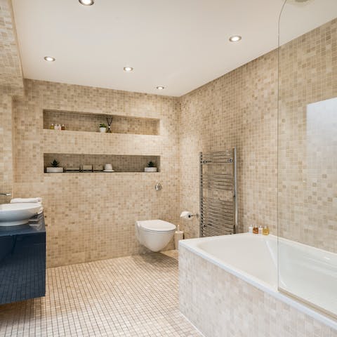 Enjoy a long soak in one of three swanky en-suite bathrooms