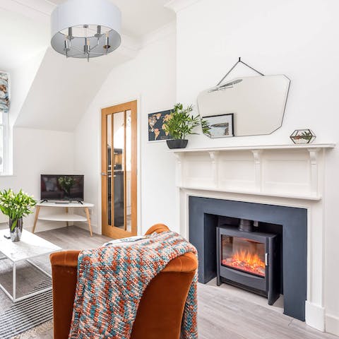 Bag a seat by the home's fireplace and bask in its warmth
