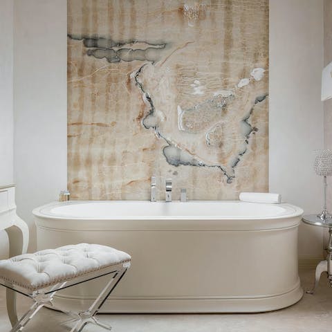Unwind in the standing bath tub after a long day in the heat
